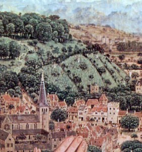 Vineyards and a Church visible in the background behind Rolin